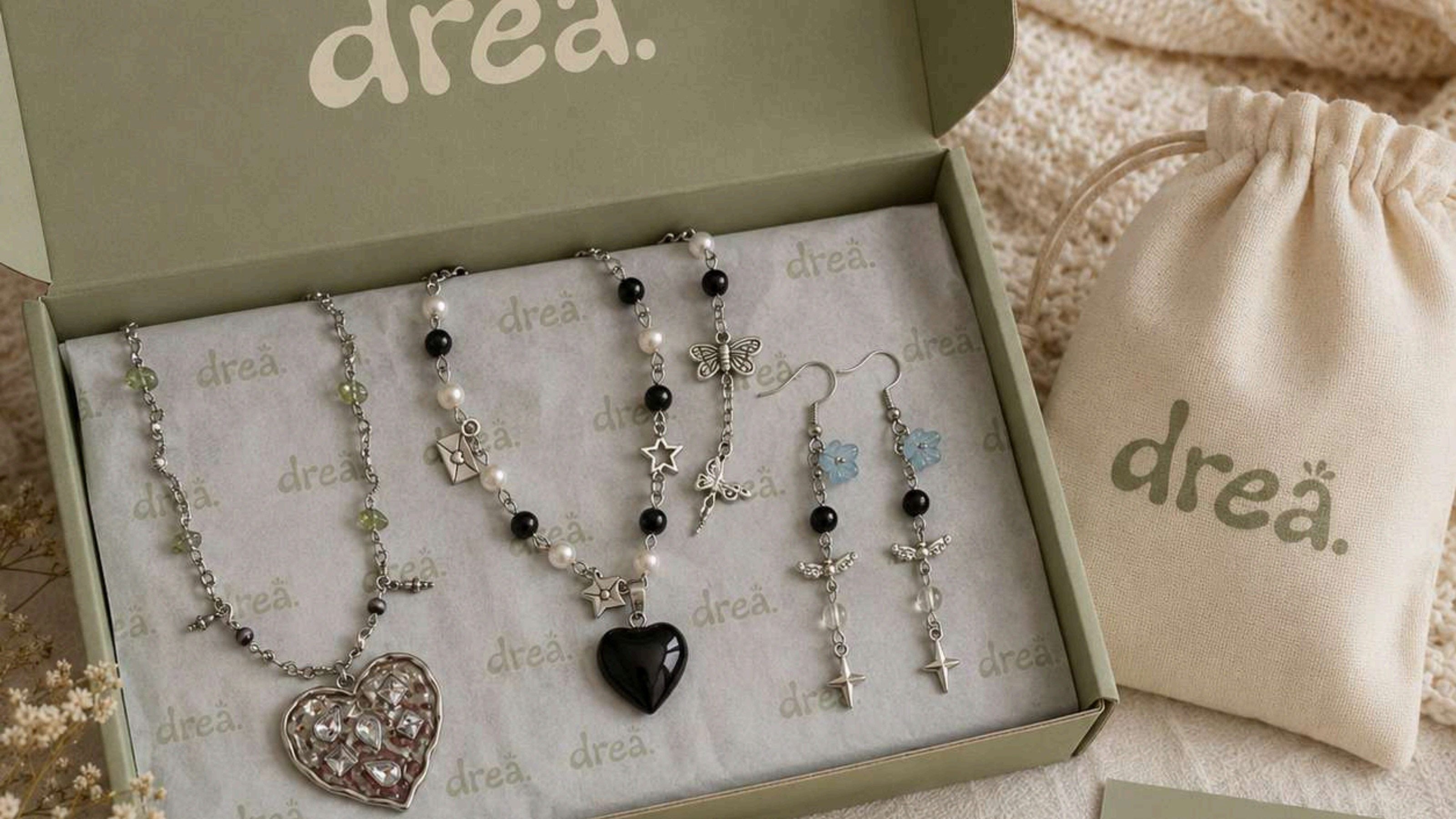 drea. gift box with branded drawstring bag